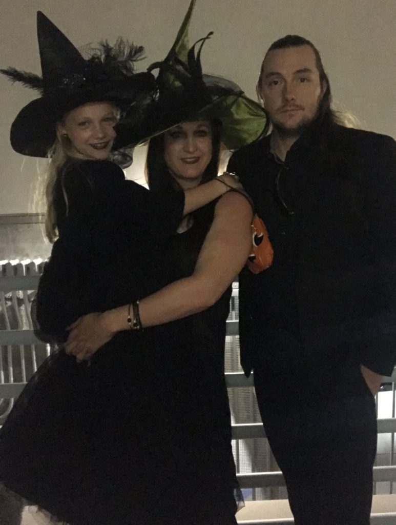 family dressed up as witches for brunch