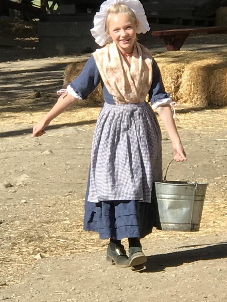 colonial girl doing chores